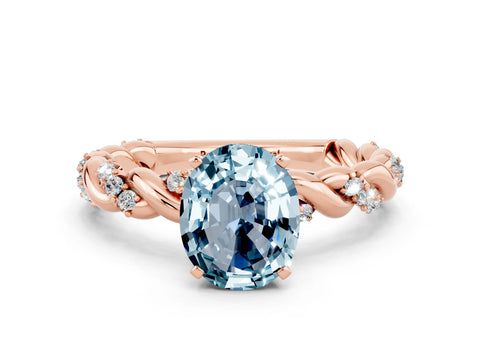 Rose gold Oval Cut Aquamarine Solitaire Ring with Twisted Band and Pavé Accents