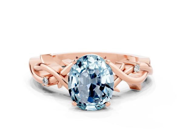 Rose gold Oval Cut Aquamarine Solitaire Ring with Twisted Band and Prong Setting