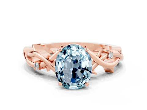 Rose gold Oval Cut Aquamarine Solitaire Ring with Twisted Band and Prong Setting