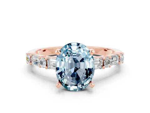Rose gold Oval Cut Aquamarine Solitaire with Side Baguettes and Channel Set Band