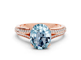 Rose gold Oval Cut Aquamarine Split Shank Engagement Ring with Pavé Band