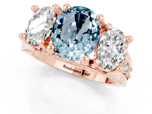 Rose gold Oval Cut Aquamarine Three-Stone Ring with Channel Set Band and Four-Prong Setting