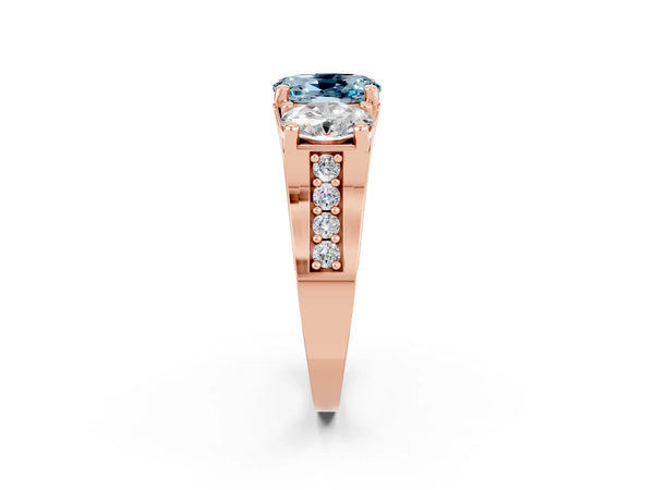 Rose gold Oval Cut Aquamarine Three-Stone Ring with Channel Set Band and Four-Prong Setting