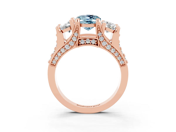Rose gold Oval Cut Aquamarine Three-Stone Ring with Channel Set Band and Four-Prong Setting