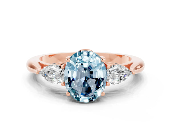 Rose gold Oval Cut Aquamarine Three-Stone Ring with Pear  Side Stones and Prong Setting
