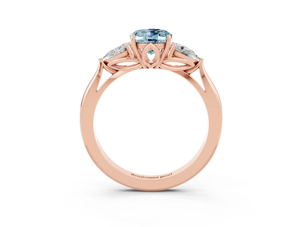 Rose gold Oval Cut Aquamarine Three-Stone Ring with Pear  Side Stones and Prong Setting