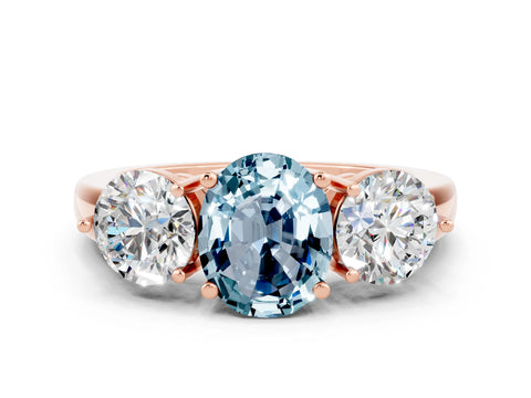 Rose gold Oval Cut Aquamarine Three-Stone Ring with Prong Setting and Classic Band