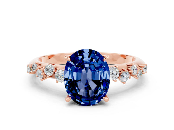 Rose gold Oval Cut Blue Sapphire Cluster Side Stone Solitaire Ring with Prong Setting