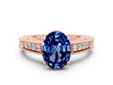 Rose gold Oval Cut Blue Sapphire Engagement Ring with Milgrain Channel Set Band and Prong Setting