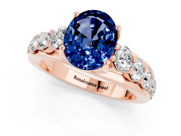 Rose gold Oval Cut Blue Sapphire Engagement Ring with Pavé Band and Four-Prong Setting