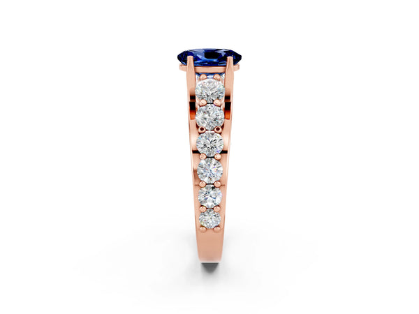 Rose gold Oval Cut Blue Sapphire Engagement Ring with Pavé Band and Four-Prong Setting