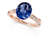 Rose gold Oval Cut Blue Sapphire Engagement Ring with Side Stone Accents and Four-Prong Setting_61