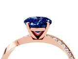 Rose gold Oval Cut Blue Sapphire Engagement Ring with Side Stone Accents and Four-Prong Setting_64