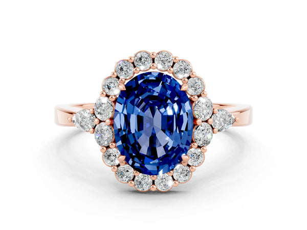Rose gold Oval Cut Blue Sapphire Halo Ring with Pear Side Stones and Prong Setting