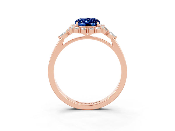 Rose gold Oval Cut Blue Sapphire Halo Ring with Pear Side Stones and Prong Setting