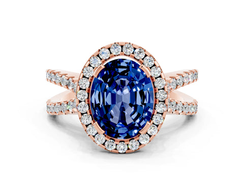 Rose gold Oval Cut Blue Sapphire Halo Ring with Split Shank Pavé Band and Prong Setting