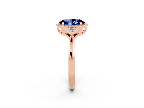 Rose gold Oval Cut Blue Sapphire Halo Ring with Tapered Band and Four-Prong Setting