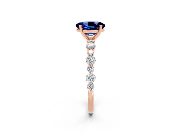 Rose gold Oval Cut Blue Sapphire Prong Set Engagement Ring with Pavé Band