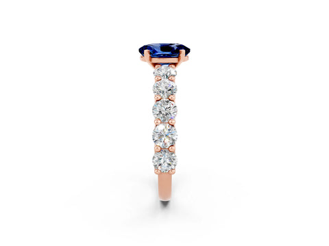 Rose gold Oval Cut Blue Sapphire Prong Setting with Side Stones on a Pave Band_2