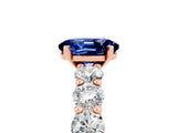 Rose gold Oval Cut Blue Sapphire Prong Setting with Side Stones on a Pave Band_5