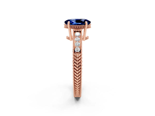 Rose gold Oval Cut Blue Sapphire Ring with Milgrain Pavé Band and Four-Prong Setting