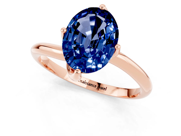 Rose gold Oval Cut Blue Sapphire Solitaire Engagement Ring with Four-Prong Setting and Classic Band