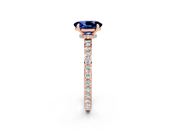 Rose gold Oval Cut Blue Sapphire Solitaire Engagement Ring with Pavé Band and Four-Prong Setting