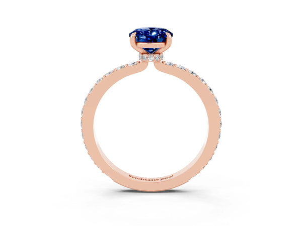 Rose gold Oval Cut Blue Sapphire Solitaire Engagement Ring with Pavé Band and Four-Prong Setting