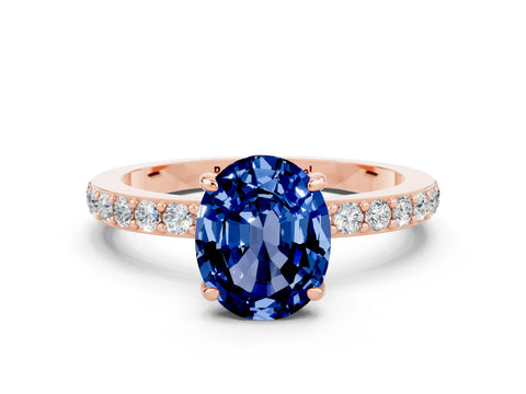 Rose gold Oval Cut Blue Sapphire Solitaire Engagement Ring with Pavé Band and Four-Prong Setting
