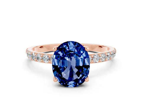 Rose gold Oval Cut Blue Sapphire Solitaire Engagement Ring with Pavé Band and Prong Setting