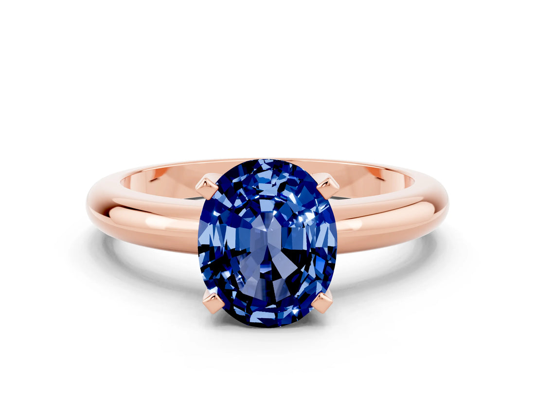 Rose gold Oval Cut Blue Sapphire Solitaire Engagement Ring with Round Band and Four-Prong Setting