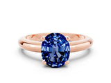 Rose gold Oval Cut Blue Sapphire Solitaire Engagement Ring with Round Band and Four-Prong Setting