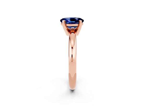 Rose gold Oval Cut Blue Sapphire Solitaire Engagement Ring with Round Band and Four-Prong Setting