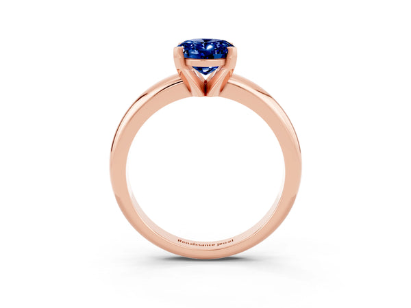 Rose gold Oval Cut Blue Sapphire Solitaire Engagement Ring with Round Band and Four-Prong Setting