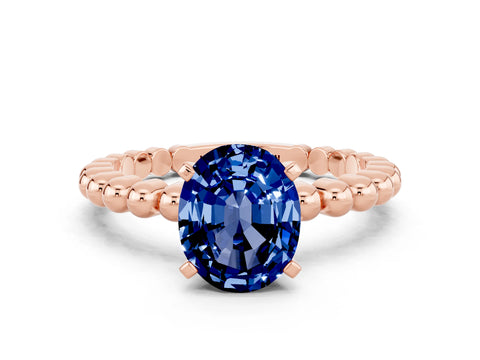 Rose gold Oval Cut Blue Sapphire Solitaire Ring with Beaded Band and Prong Setting