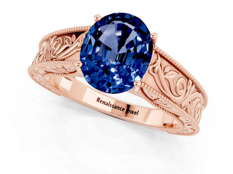 Rose gold Oval Cut Blue Sapphire Solitaire Ring with Engraved Band and Four-Prong Setting_1
