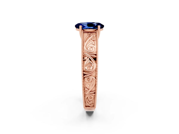 Rose gold Oval Cut Blue Sapphire Solitaire Ring with Engraved Band and Four-Prong Setting