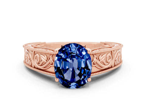 Rose gold Oval Cut Blue Sapphire Solitaire Ring with Engraved Band and Four-Prong Setting