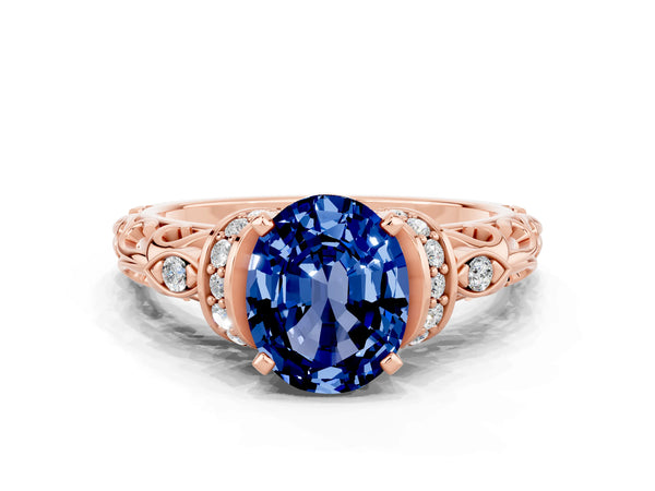 Rose gold Oval Cut Blue Sapphire Solitaire Ring with Filigree Band and Four-Prong Setting