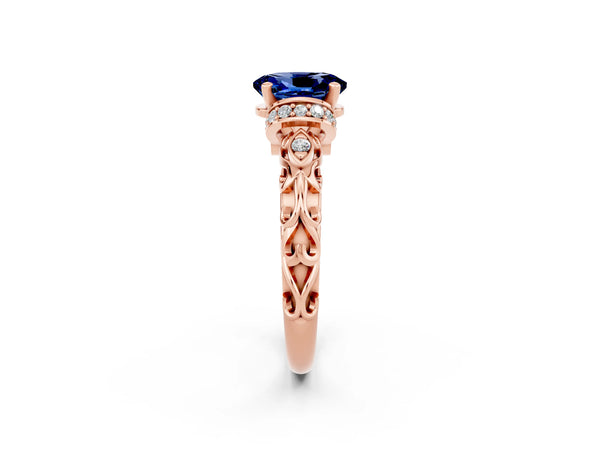 Rose gold Oval Cut Blue Sapphire Solitaire Ring with Filigree Band and Four-Prong Setting