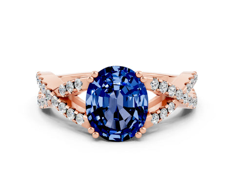 Rose gold Oval Cut Blue Sapphire Solitaire Ring with Four-Prong Setting and Twisted Pavé Band