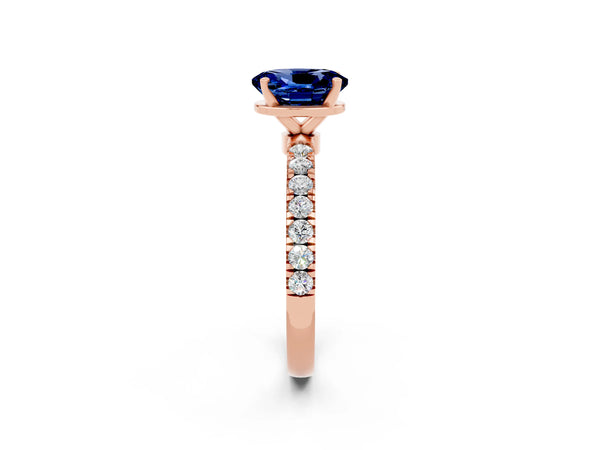 Rose gold Oval Cut Blue Sapphire Solitaire Ring with Pavé Accents and Four-Prong Setting