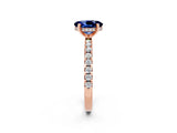 Rose gold Oval Cut Blue Sapphire Solitaire Ring with Pavé Band and Four-Prong Setting_26