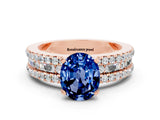 Rose gold Oval Cut Blue Sapphire Solitaire Ring with Pavé and Channel Set Band