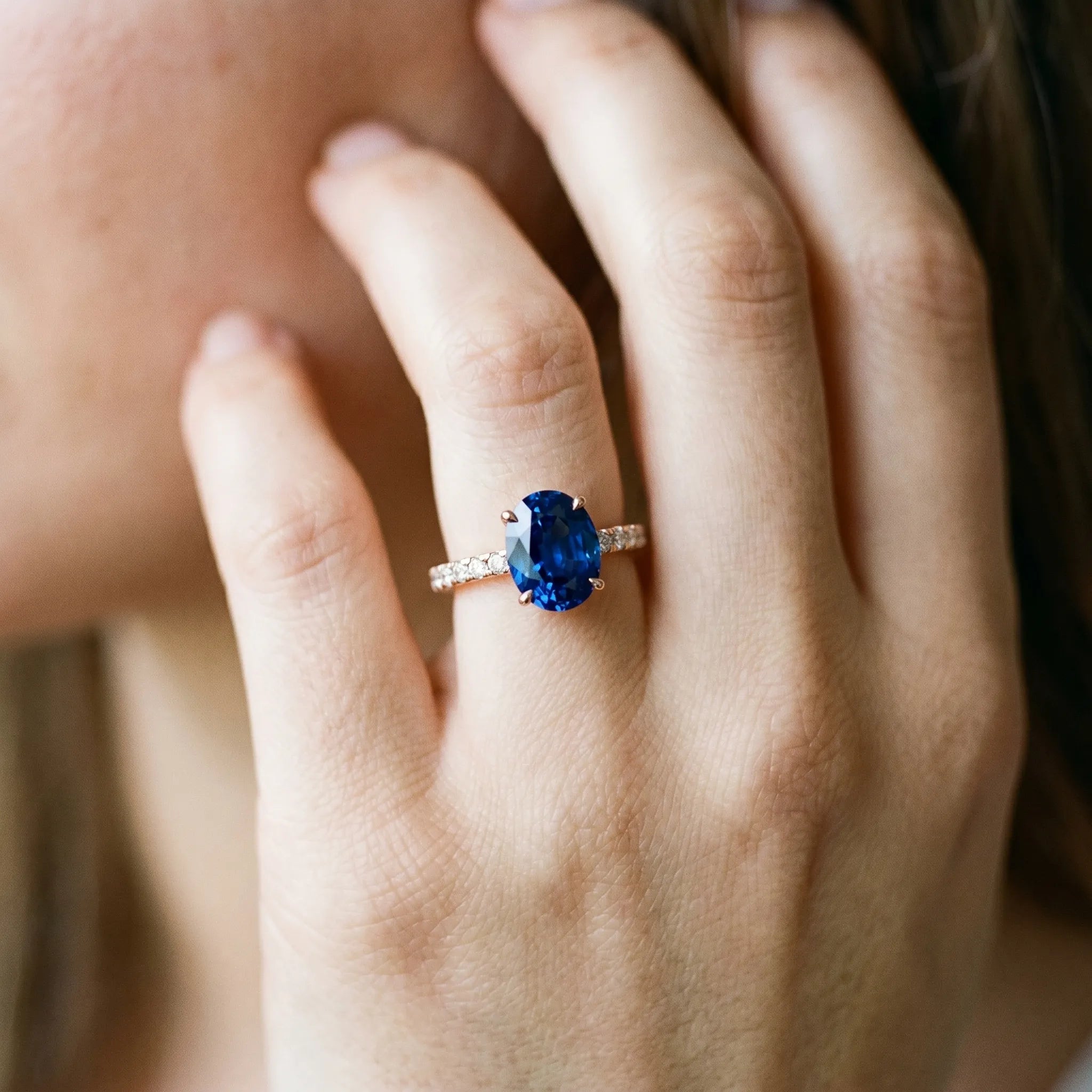 Rose gold Oval Cut Blue Sapphire Solitaire Ring with Round  Pavé Band and Four-Prong Setting_44