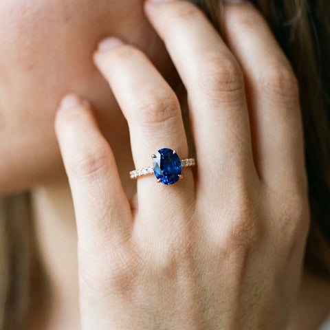 Rose gold Oval Cut Blue Sapphire Solitaire Ring with Round  Pavé Band and Four-Prong Setting_44