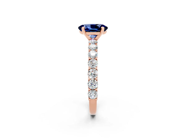 Rose gold Oval Cut Blue Sapphire Solitaire Ring with Shared Prong Pavé Band and Four-Prong Setting