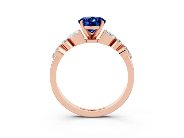 Rose gold Oval Cut Blue Sapphire Solitaire Ring with Side Stones and Four-Prong Setting