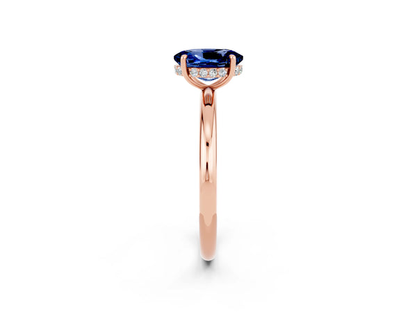 Rose gold Oval Cut Blue Sapphire Solitaire Ring with Thin Band and Four-Prong Setting