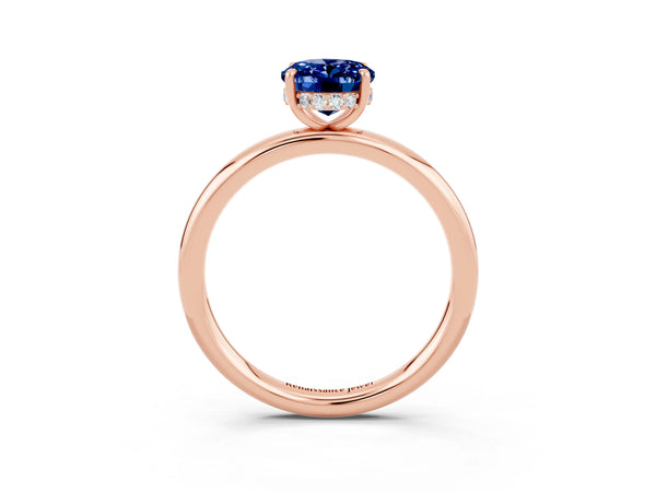 Rose gold Oval Cut Blue Sapphire Solitaire Ring with Thin Band and Four-Prong Setting